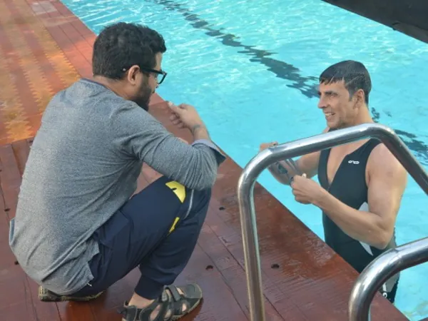 Bappaditya Roy directing Akshay Kumar during a Rasna commercial shoot